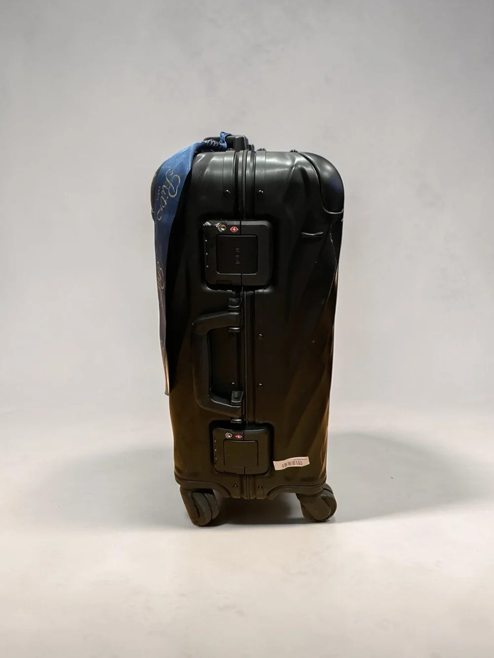 Tumi Black Diagonal-Rib Hard-Shell Spinner Carry-On